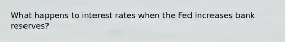 What happens to interest rates when the Fed increases bank reserves?