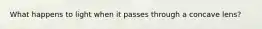 What happens to light when it passes through a concave lens?