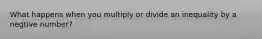 What happens when you multiply or divide an inequality by a negtive number?