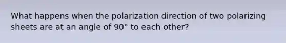 What happens when the polarization direction of two polarizing sheets are at an angle of 90° to each other?