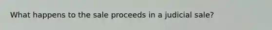 What happens to the sale proceeds in a judicial sale?