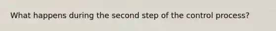 What happens during the second step of the control process?