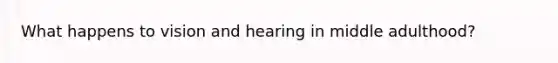 What happens to vision and hearing in middle adulthood?