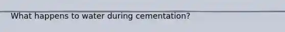 What happens to water during cementation?