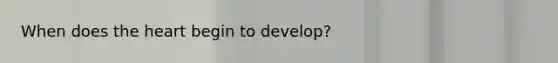 When does the heart begin to develop?