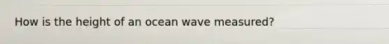 How is the height of an ocean wave measured?