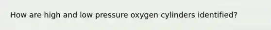 How are high and low pressure oxygen cylinders identified?