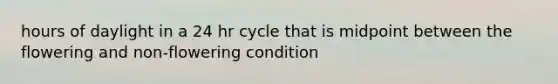 hours of daylight in a 24 hr cycle that is midpoint between the flowering and non-flowering condition