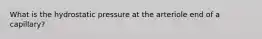 What is the hydrostatic pressure at the arteriole end of a capillary?