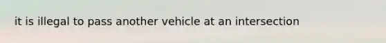 it is illegal to pass another vehicle at an intersection