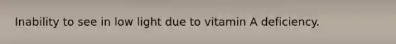 Inability to see in low light due to vitamin A deficiency.