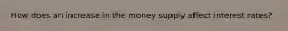 How does an increase in the money supply affect interest rates?