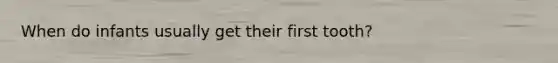 When do infants usually get their first tooth?