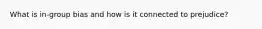 What is in-group bias and how is it connected to prejudice?