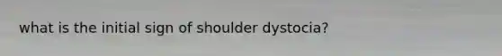 what is the initial sign of shoulder dystocia?