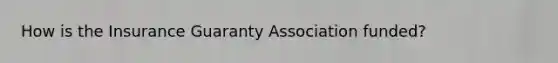 How is the Insurance Guaranty Association funded?