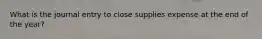 What is the journal entry to close supplies expense at the end of the year?