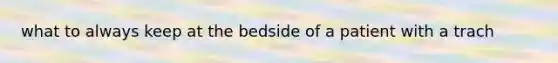 what to always keep at the bedside of a patient with a trach