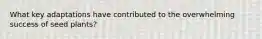 What key adaptations have contributed to the overwhelming success of seed plants?
