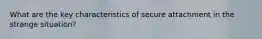 What are the key characteristics of secure attachment in the strange situation?