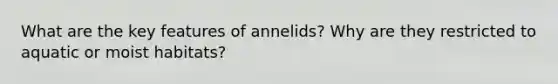 What are the key features of annelids? Why are they restricted to aquatic or moist habitats?