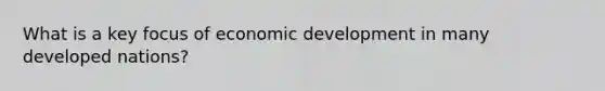 What is a key focus of economic development in many developed nations?