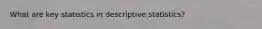 What are key statistics in descriptive statistics?