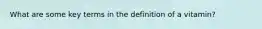 What are some key terms in the definition of a vitamin?