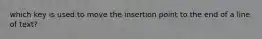 which key is used to move the insertion point to the end of a line of text?