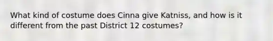 What kind of costume does Cinna give Katniss, and how is it different from the past District 12 costumes?