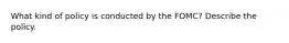 What kind of policy is conducted by the FOMC? Describe the policy.