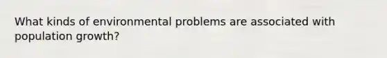 What kinds of environmental problems are associated with population growth?