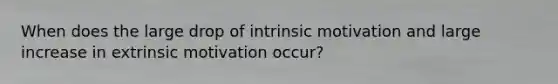 When does the large drop of intrinsic motivation and large increase in extrinsic motivation occur?