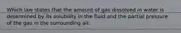 Which law states that the amount of gas dissolved in water is determined by its solubility in the fluid and the partial pressure of the gas in the surrounding air.