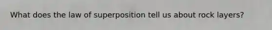 What does the law of superposition tell us about rock layers?