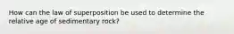 How can the law of superposition be used to determine the relative age of sedimentary rock?