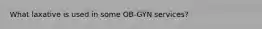 What laxative is used in some OB-GYN services?