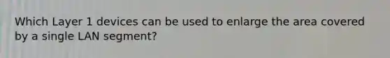 Which Layer 1 devices can be used to enlarge the area covered by a single LAN segment?