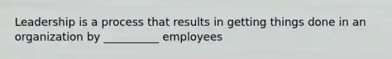 Leadership is a process that results in getting things done in an organization by __________ employees