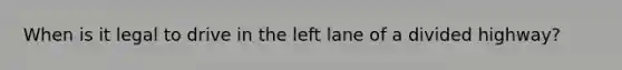 When is it legal to drive in the left lane of a divided highway?