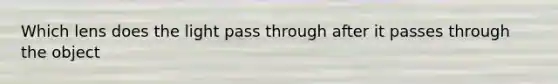 Which lens does the light pass through after it passes through the object