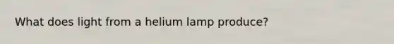 What does light from a helium lamp produce?