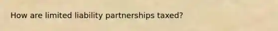 How are limited liability partnerships taxed?