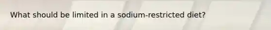 What should be limited in a sodium-restricted diet?