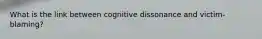 What is the link between cognitive dissonance and victim-blaming?