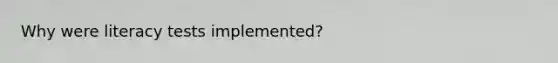 Why were literacy tests implemented?