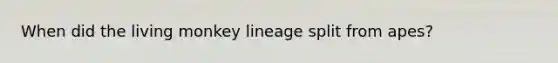 When did the living monkey lineage split from apes?