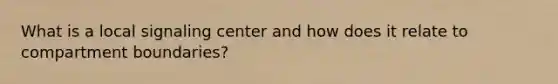 What is a local signaling center and how does it relate to compartment boundaries?