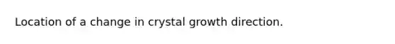 Location of a change in crystal growth direction.