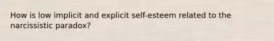 How is low implicit and explicit self-esteem related to the narcissistic paradox?